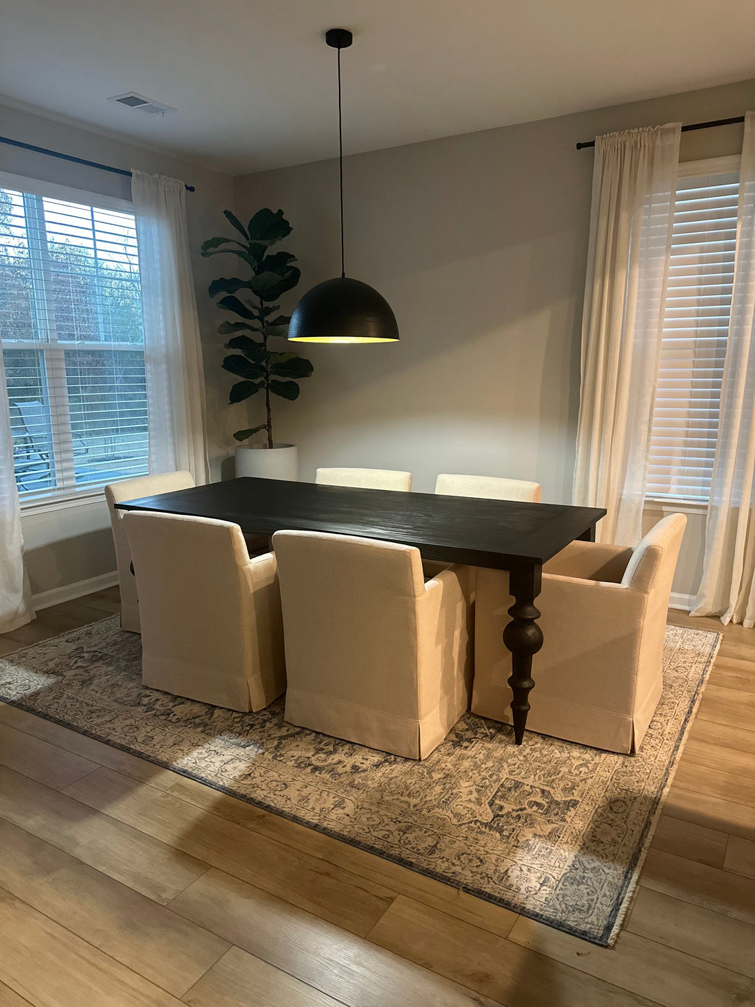 Black hardwood table with turned legs